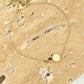 Bracelet coin with gold-colored heart