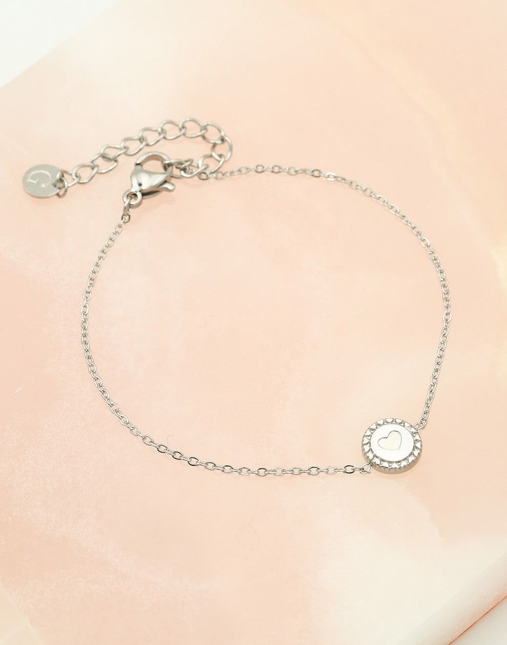 Bracelet coin with silver-colored heart
