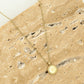 Ketting munt met hartje goudkleurig