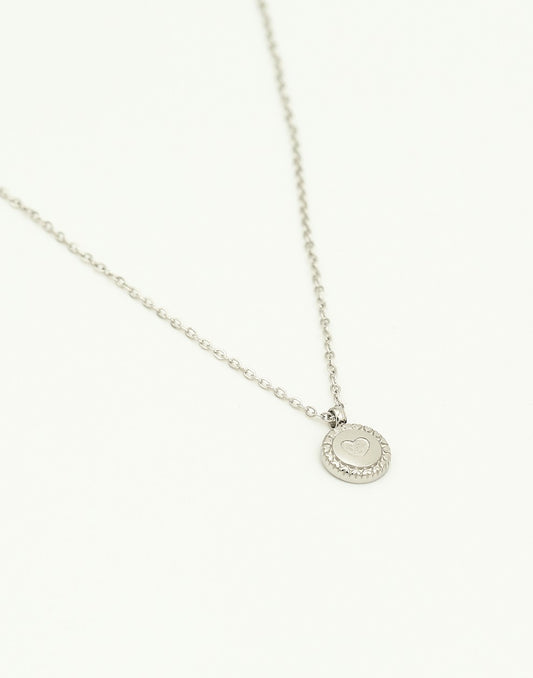 Ketting munt met hartje zilverkleurig