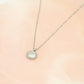 Ketting munt met hartje zilverkleurig