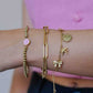stretch armband smiley roze