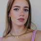 schakelketting met smiley muntjes goudkleurig