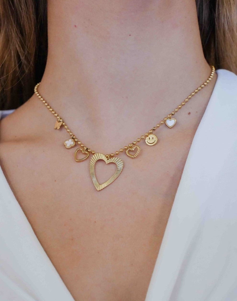 Ketting met bedels groot hart goudkleurig