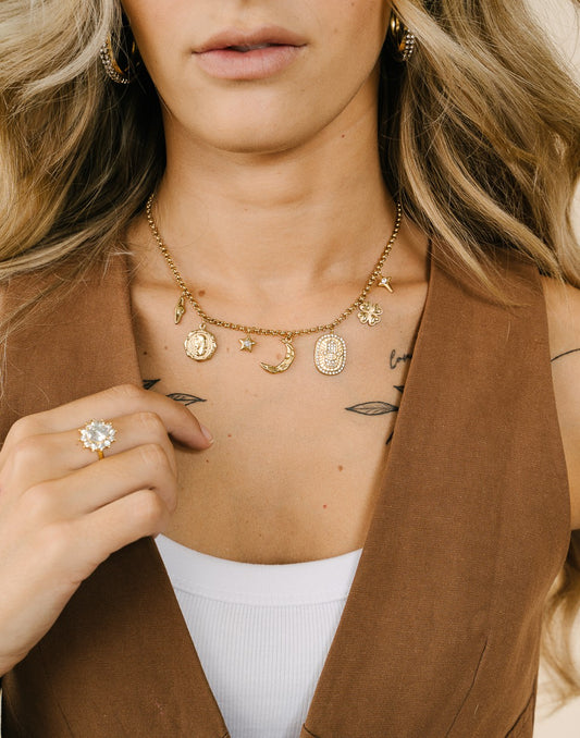 Bedel ketting maan space goudkleurig