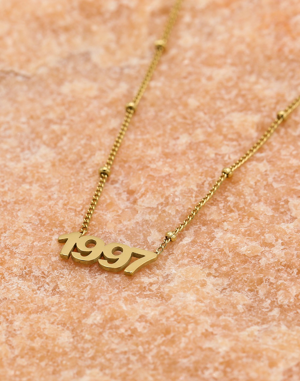 Ketting jaartal 1997 goudkleurig