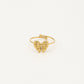 Gold-colored ring with bow