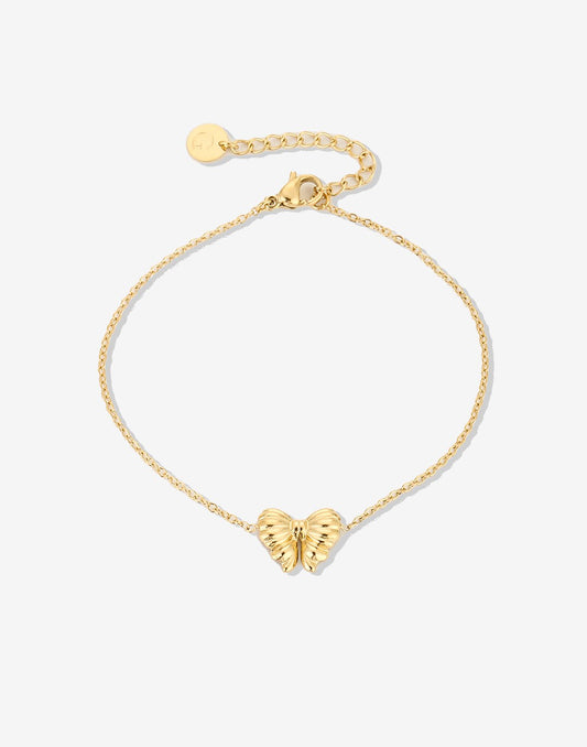 armband strikje goudkleurig