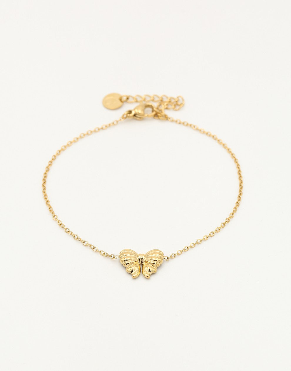armband strikje goudkleurig