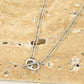 Paperclip ketting met symbool kapittelsluiting zilverkleurig