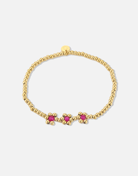 Stretch armband bolletjes bloemen fuchsia