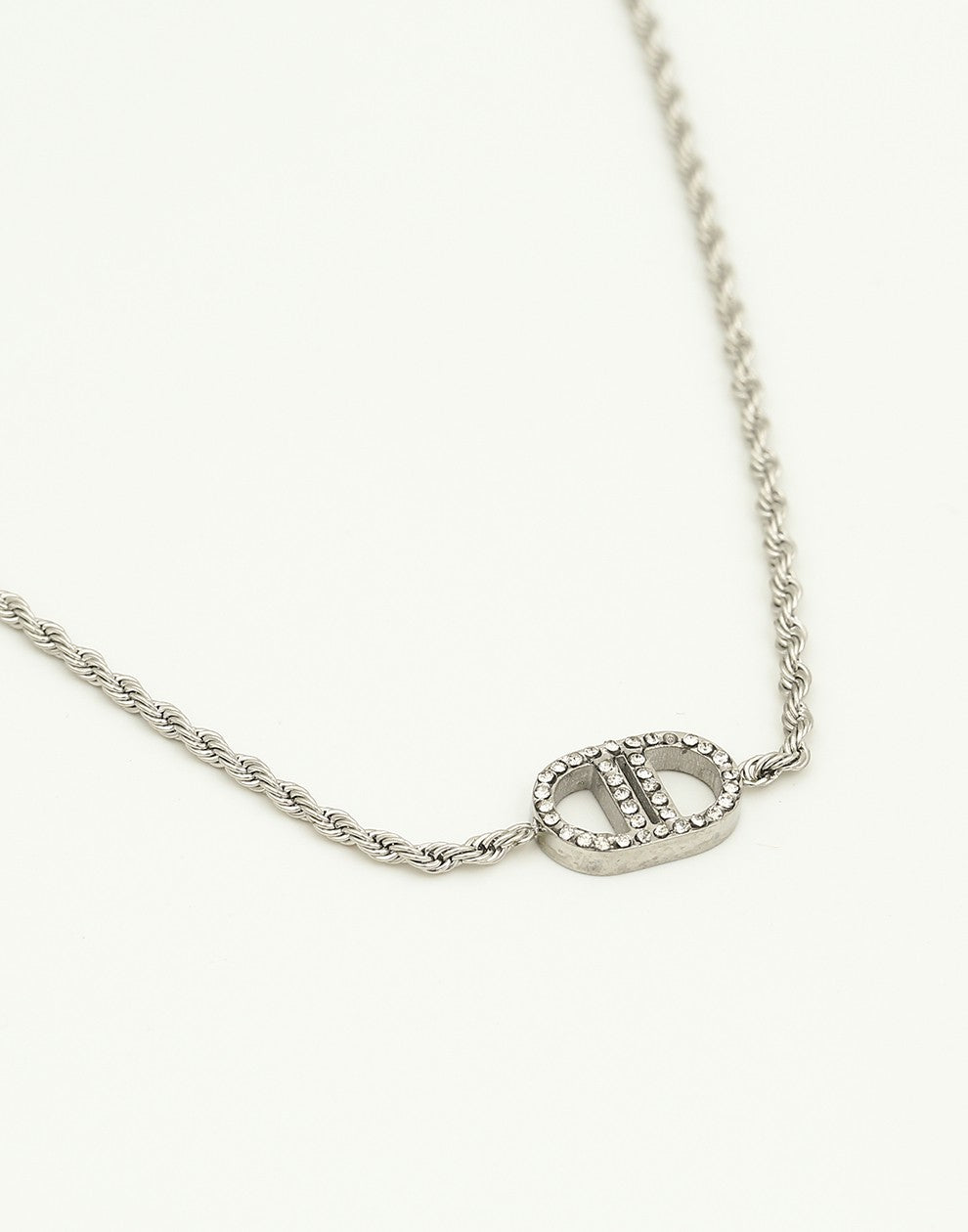 Gedraaide schakelketting met symbool strass zilverkleurig