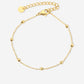 goudkleurigen dotted armband