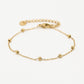 goudkleurigen dotted armband