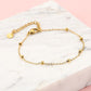 goudkleurigen dotted armband