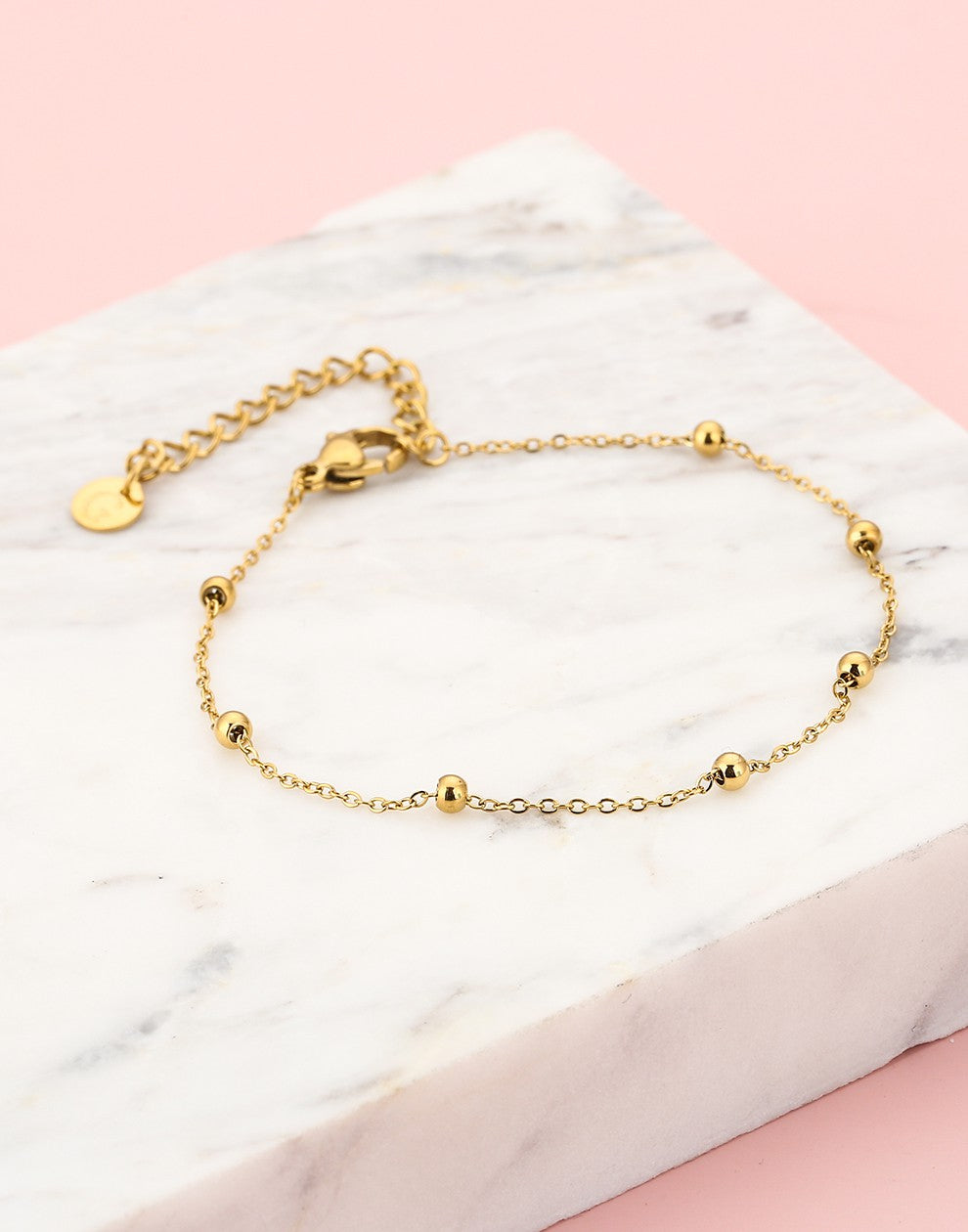 goudkleurigen dotted armband