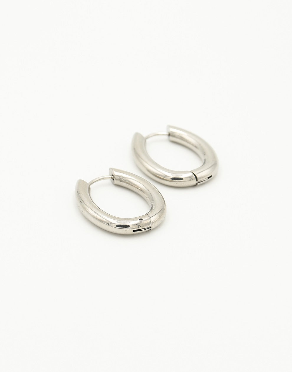 chunky oval silver-colored hoop earrings