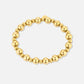statement armband bollen goudkleurig