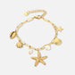 Bedelarmband zeester goudkleurig