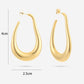 asymmetrische hoop oorbellen goudkleurig