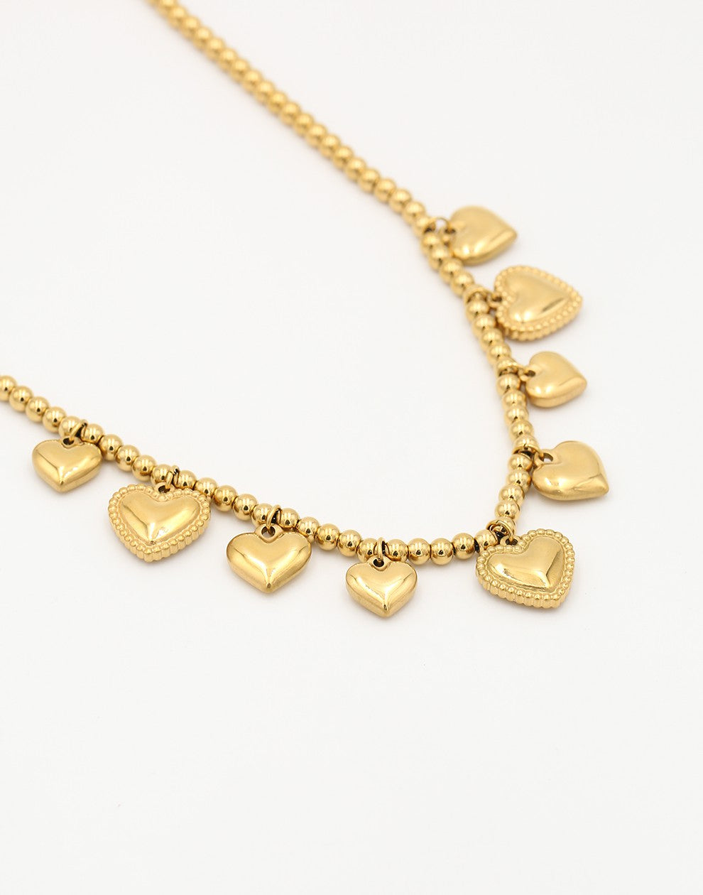 bolletjes ketting bali hartjes goudkleurig