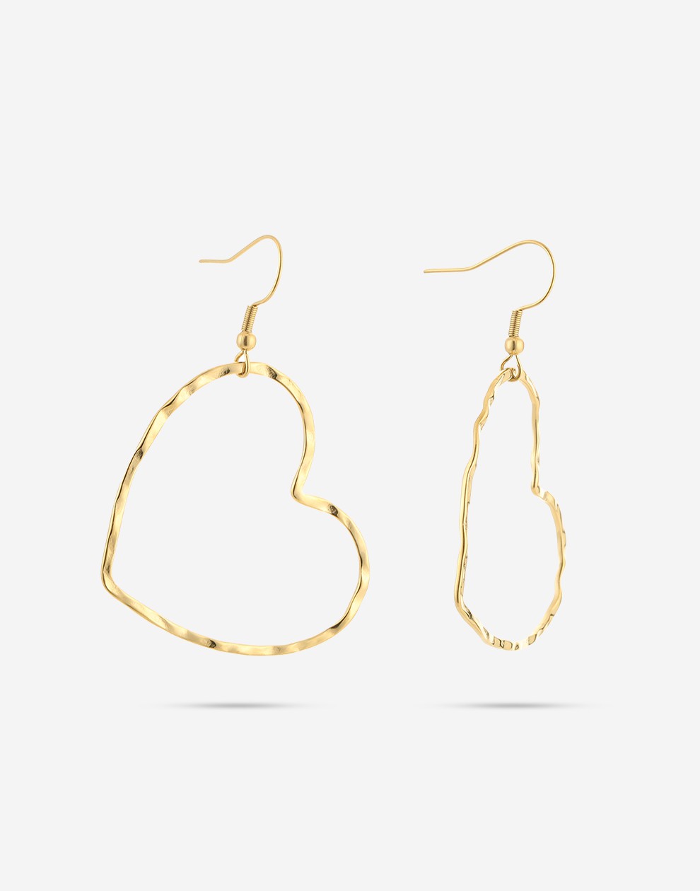 gold-colored open heart earrings
