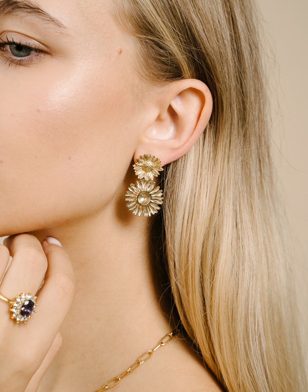Gold-colored sunflower earrings
