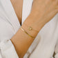 armband strikje goudkleurig