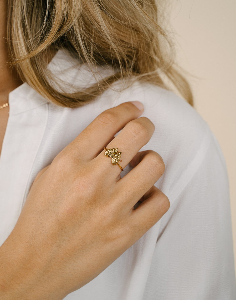 Ring strikje goudkleurig