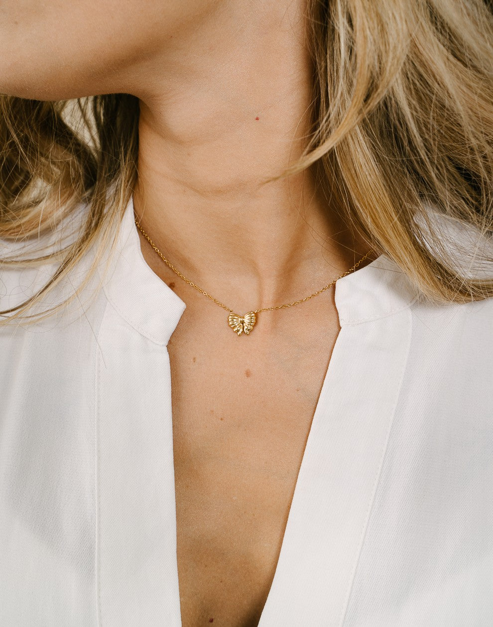 ketting strikje goudkleurig