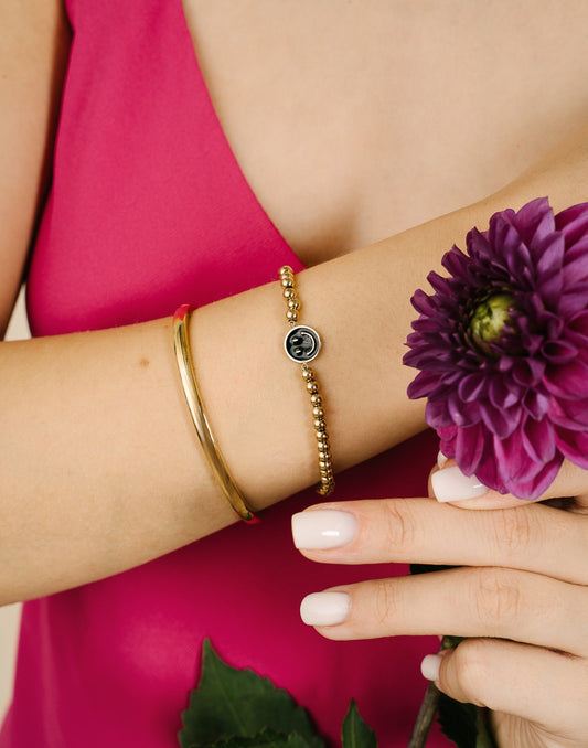 stretch armband smiley zwart