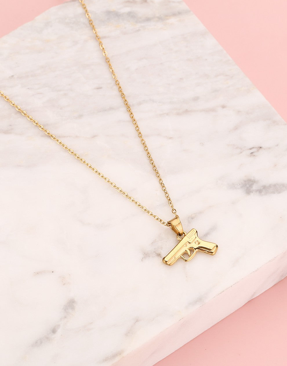 Gun necklace gold