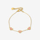 armband drie hartjes roze goudkleurig