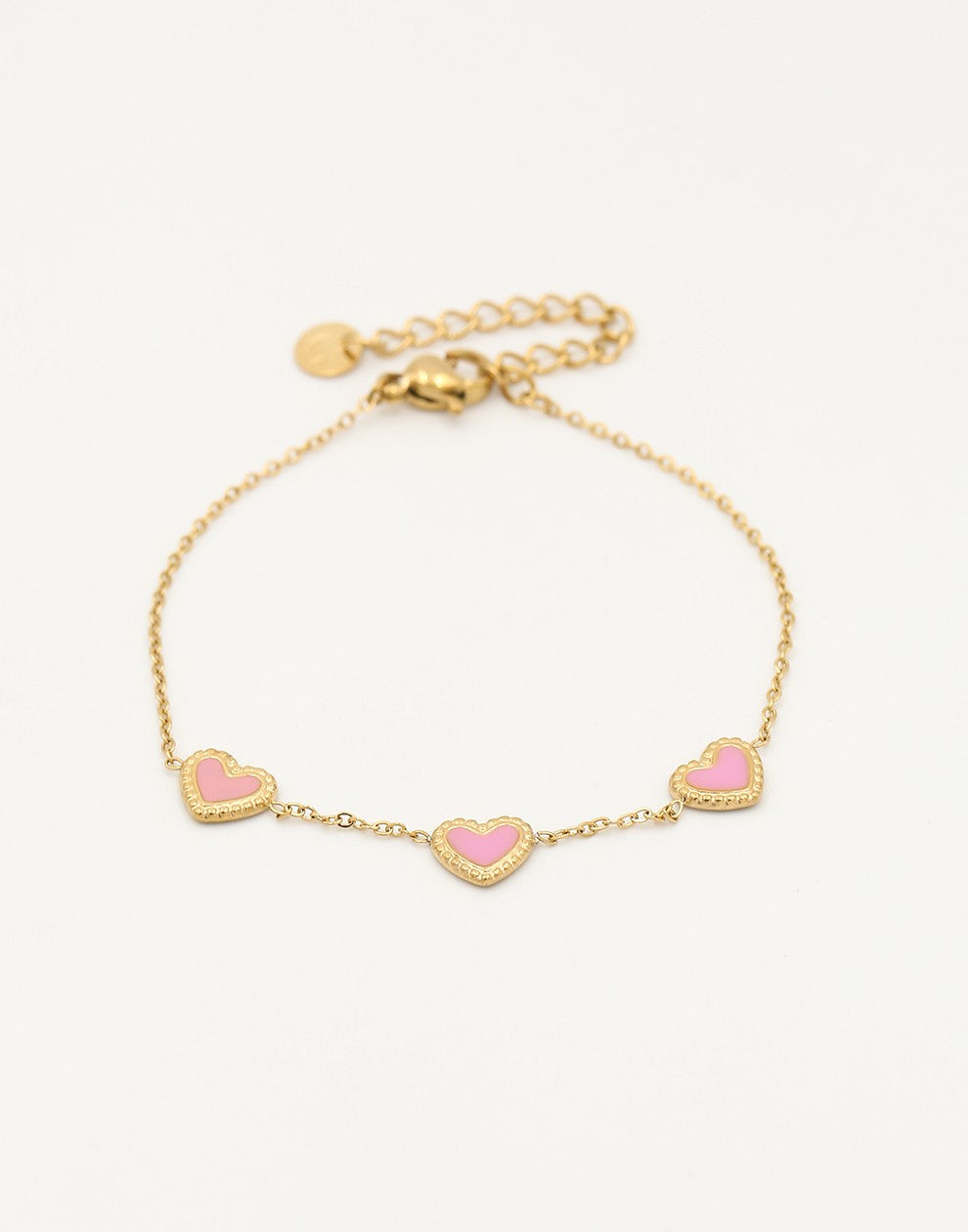 armband drie hartjes roze goudkleurig