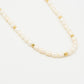 Parelketting met goudkleurigen bolletjes
