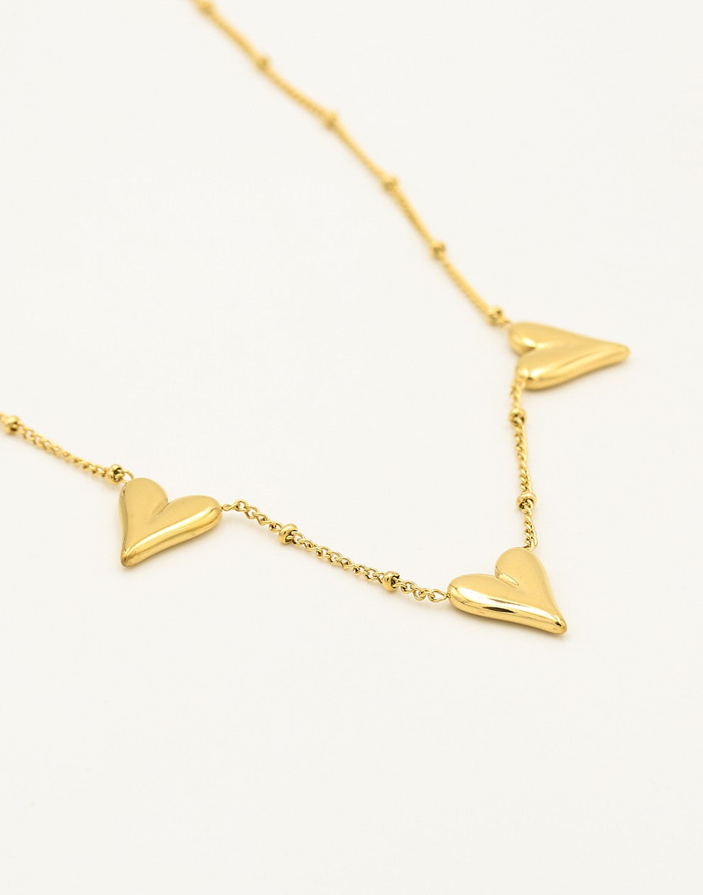 ketting drie vintage hartjes goudkleurig
