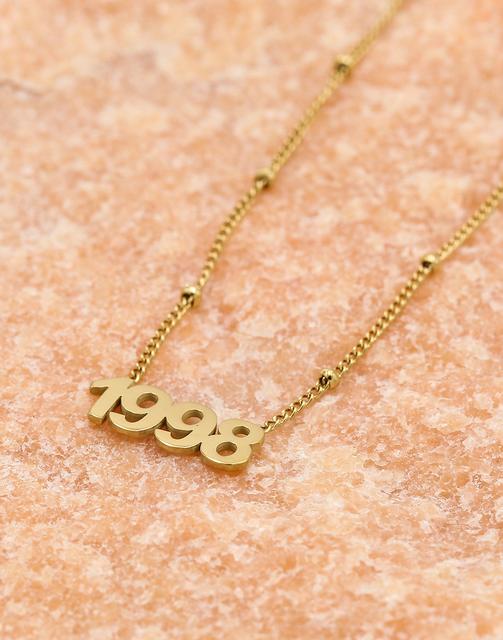 Ketting jaartal 1998 goudkleurig