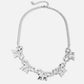 schakelketting met 5 chunky strikjes zilverkleurig
