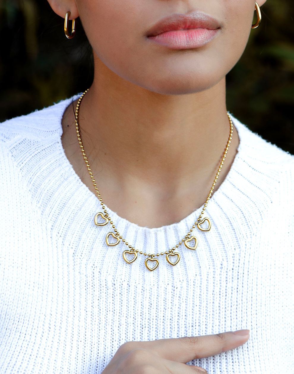 bedelketting open hartjes goudkleurig