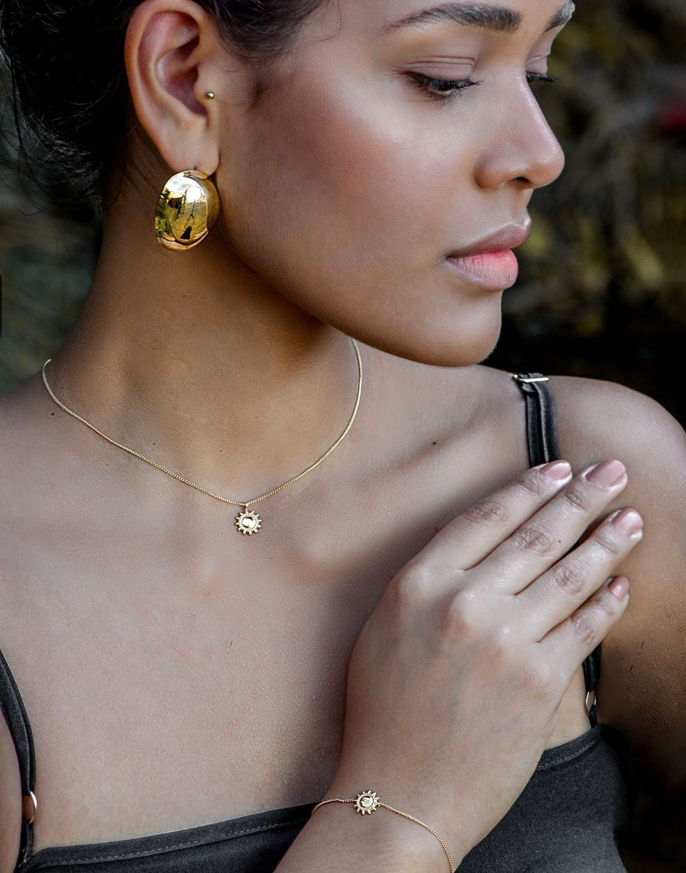 zon ketting goudkleurig