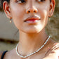 Parelketting met goudkleurigen bolletjes