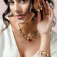 Bedelketting multi hartjes goudkleurig