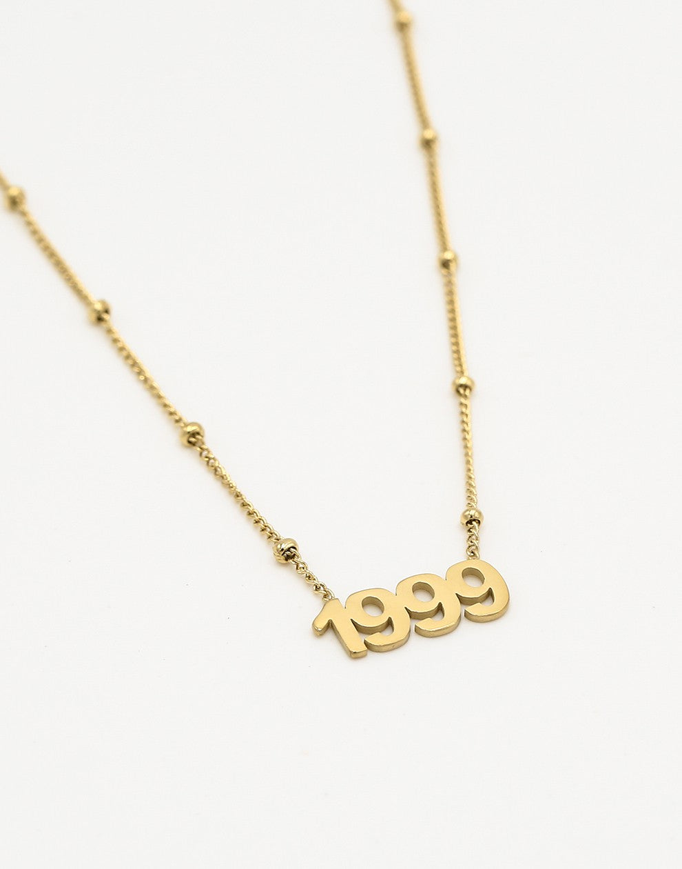 Ketting jaartal 1999 goudkleurig