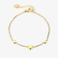 Triple heart bracelet gold-colored