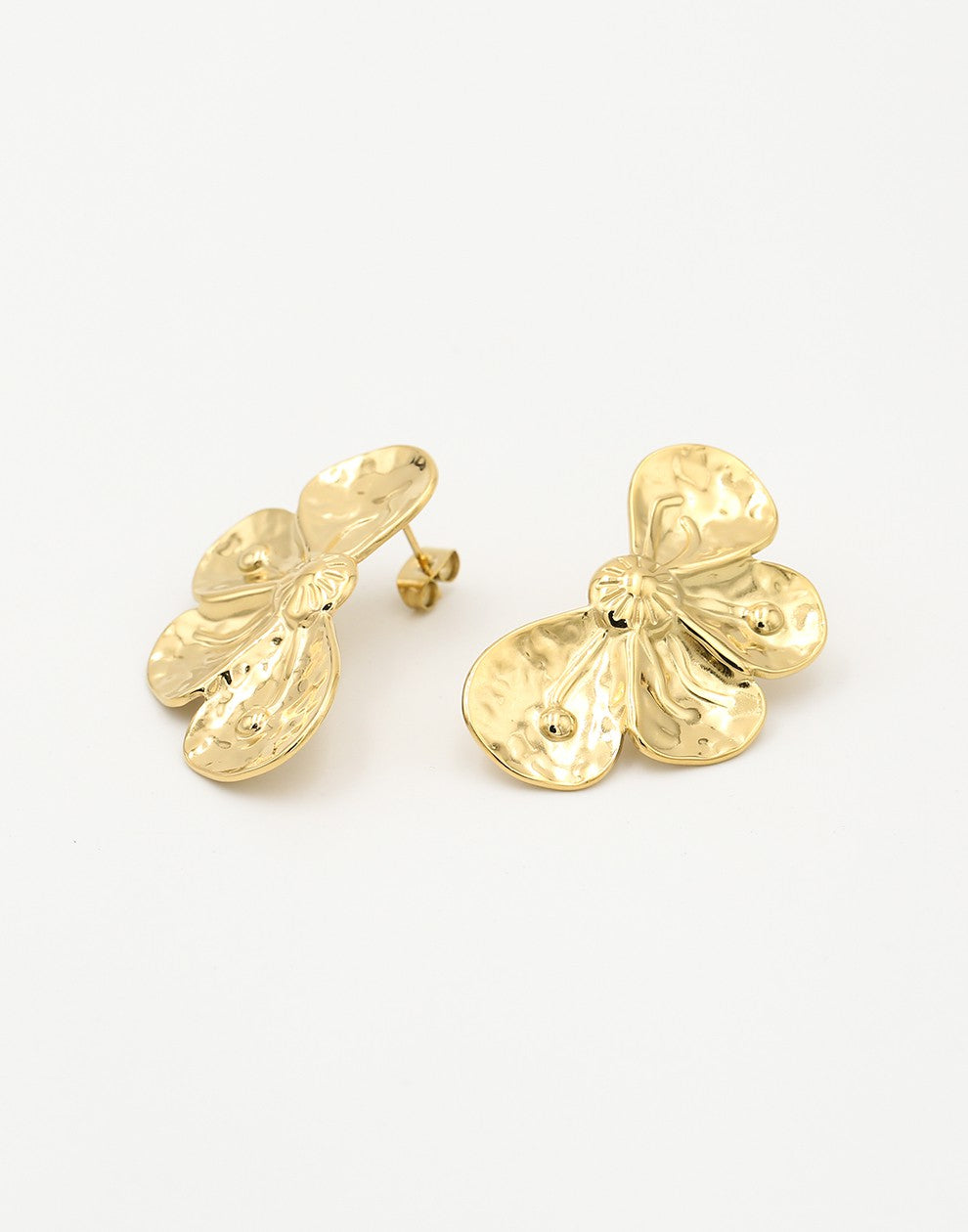 gold-colored flower stud earrings