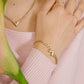 Schakelarmband V goudkleurig