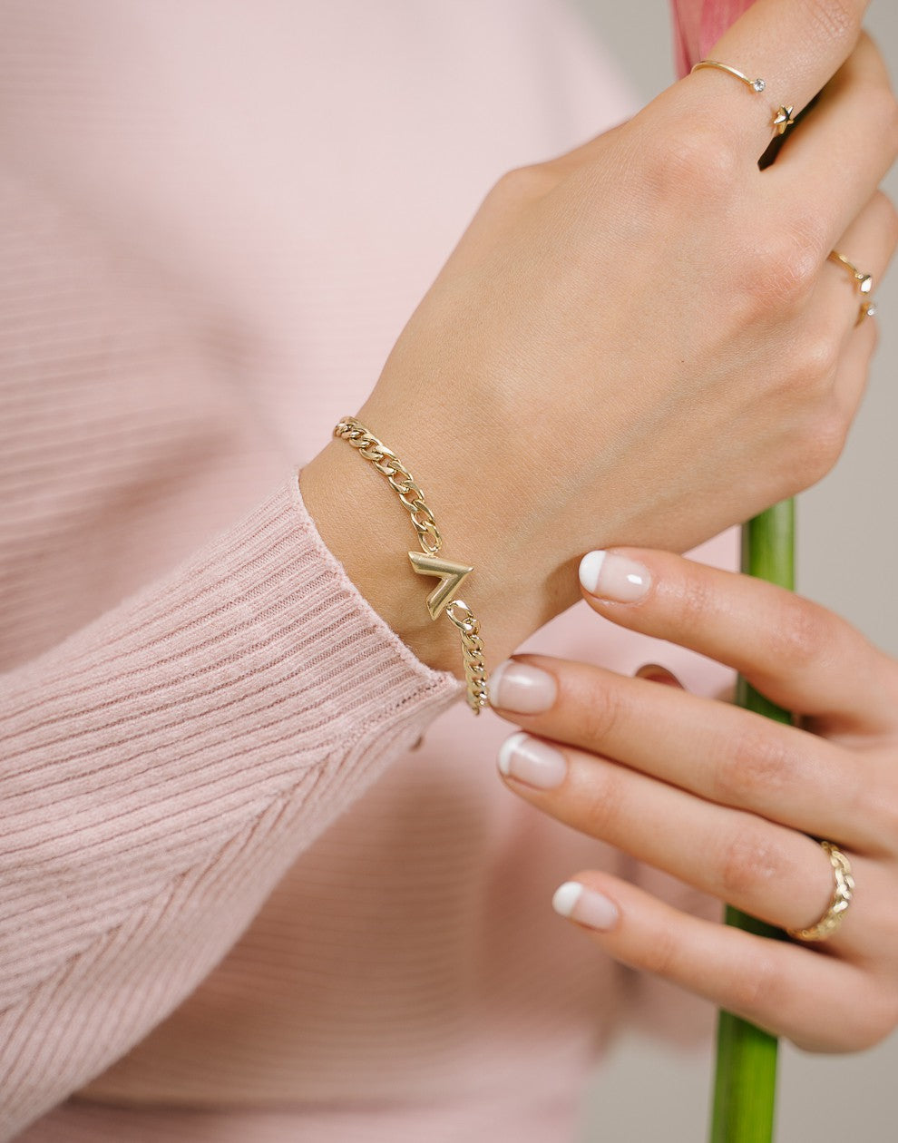 Schakelarmband V goudkleurig