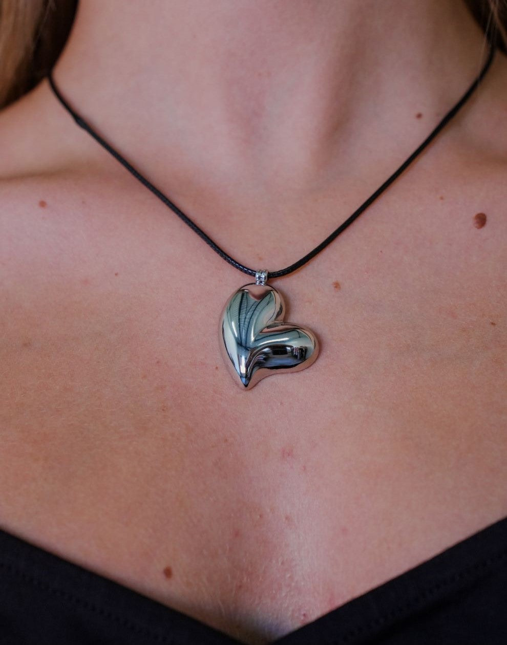 zwarte koord ketting hart zilverkleurig