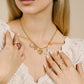 Bedel ketting maan love goudkleurig