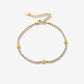 Tennis armband bolletjes goudkleurig
